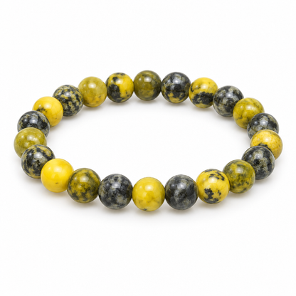 Bransoletka Grass Yellow Stone zolto-oliwkowa z ciemnymi plamami, produkt na bialym tle